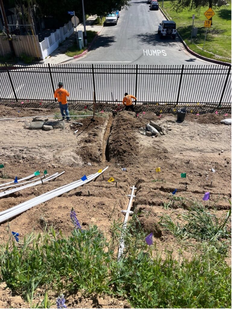 Installation of irrigation lines and valves along Strathern Ave.