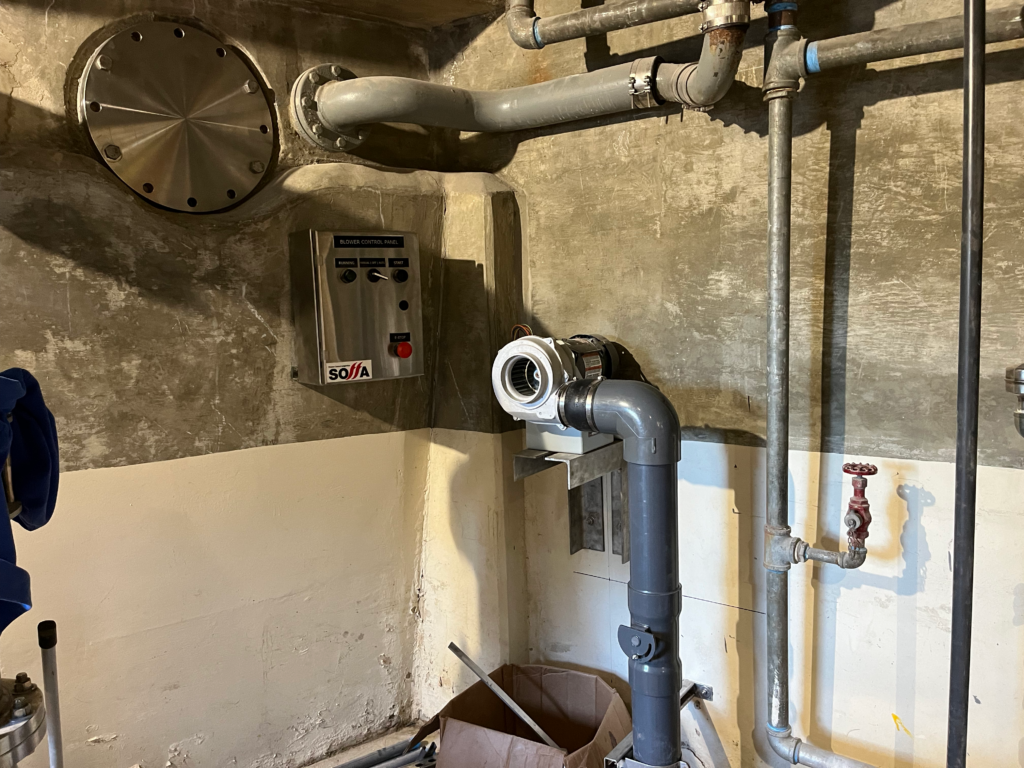 Installed blower assembly and blower control panel.